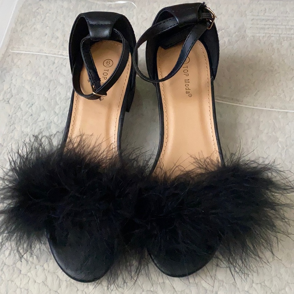 Black Feather sandles with a wedge